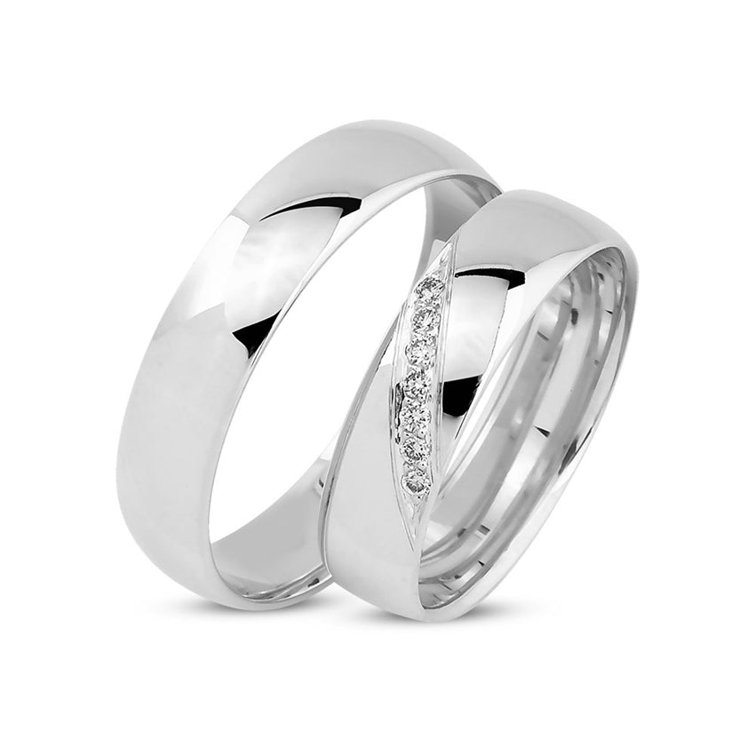 Tidløse Nuran vielsesringe i 14 kt hvidguld med 0,07 ct diamanter – elegant sæt med damering dekoreret med syv diamanter og herre ring i klassisk design.